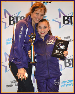 Dancer with award